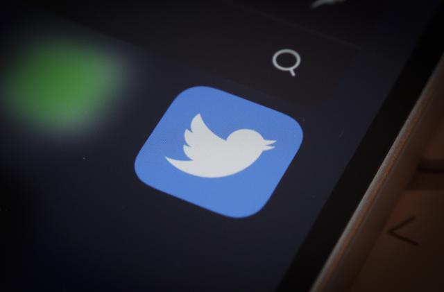The Twitter logo is seen on an iPhone mobile device in this illustration photo in Warsaw, Poland on 12 October, 2022. (Photo by STR/NurPhoto via Getty Images)