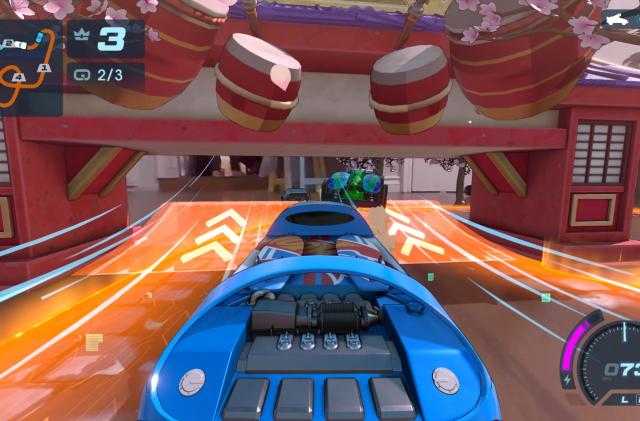 Gameplay screenshot showing a blue car driving along an orange track with bongo drums up above.