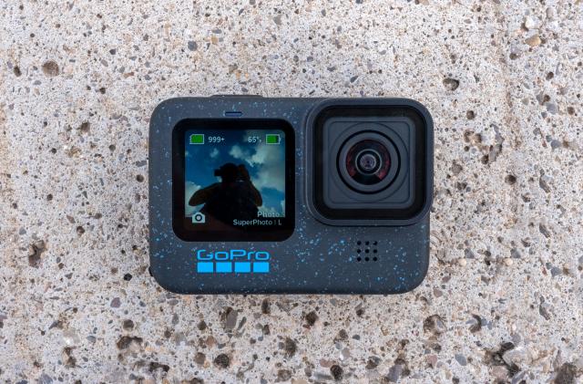 The new Hero 12 Black camera from GoPro is pictured against a concrete background.