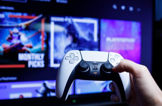 Riga, Latvia - November 23 2020: PlayStation 5 Sony reveals PS5 console and games. Dualsense controller