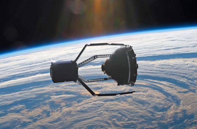 A rendering of the ClearSpace-1 craft in orbit above Earth grabbing Vespa debris.