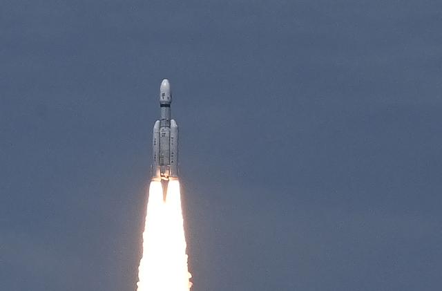 An Indian Space Research Organisation (ISRO) rocket carrying the Chandrayaan-3 spacecraft lifts off from the Satish Dhawan Space Centre in Sriharikota, an island off the coast of southern Andhra Pradesh state on July 14, 2023. India launched a rocket on July 14 carrying an unmanned spacecraft to land on the Moon, its second attempt to do so as its cut-price space programme seeks to reach new heights. (Photo by R. Satish BABU / AFP) (Photo by R. SATISH BABU/AFP via Getty Images)