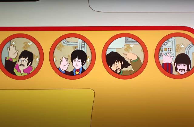 The Beatles waving goodbye. 