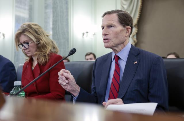 Sen. Richard Blumenthal, D-Ct., speaks along side Sen. Marsha Blackburn, R-Tenn., during a Senate Commerce, Science, and Transportation subcommittee hearing on consumer protection, product safety, and data security, examining COVID-19 fraud and price gouging, Tuesday, Feb. 1, 2022 on Capitol Hill in Washington. (Anna Moneymaker/Pool via AP)