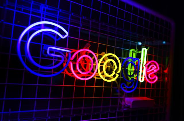 Google neon is seen during the reopening of Google office in a historical building at the Main Square in Krakow, Poland on November 29, 2022. After nearly seven years of absence, Google reopened in Krakow hiring engineers which together with hub in Warsaw will create the largest center in Europe dealing with Google Cloud computing services. (Photo by Beata Zawrzel/NurPhoto via Getty Images)