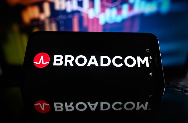 POLAND - 2023/10/31: In this photo illustration a Broadcom logo is displayed on a smartphone with stock market percentages in the background. (Photo Illustration by Omar Marques/SOPA Images/LightRocket via Getty Images)
