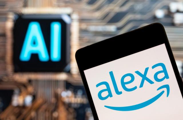 CHINA - 2023/11/10: In this photo illustration, the virtual assistant technology owned by Amazon, Alexa, logo seen displayed on a smartphone with an Artificial intelligence (AI) chip and symbol in the background. (Photo Illustration by Budrul Chukrut/SOPA Images/LightRocket via Getty Images)