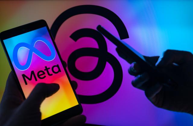 Meta logo seen displayed on a smartphone with Threads logo seen in the background. On 4 August 2023 in Brussels, Belgium. Jonathan Raa / Nurphoto (Photo by Jonathan Raa/NurPhoto via Getty Images)